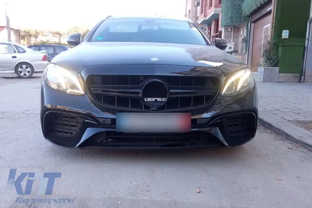 Un pachet de design tip E63 potrivit pentru Mercedes E-Class W213 2016-2019 cu ieșiri de evacuare negre și garnitură neagră, pentru modelul cu bara de protecție din spate standard.-image-6141483
